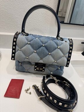 Valentino Garavani Quilted Denim Rockstud Top Handle Bag in Light Blue and Black
